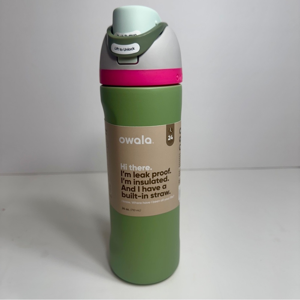 NWT. Owala insulated water bottle in sage green with pink accents. 24oz